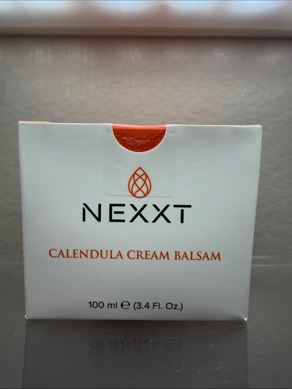NEXXT Calendula Cream Balsam - White with Orange Accents
